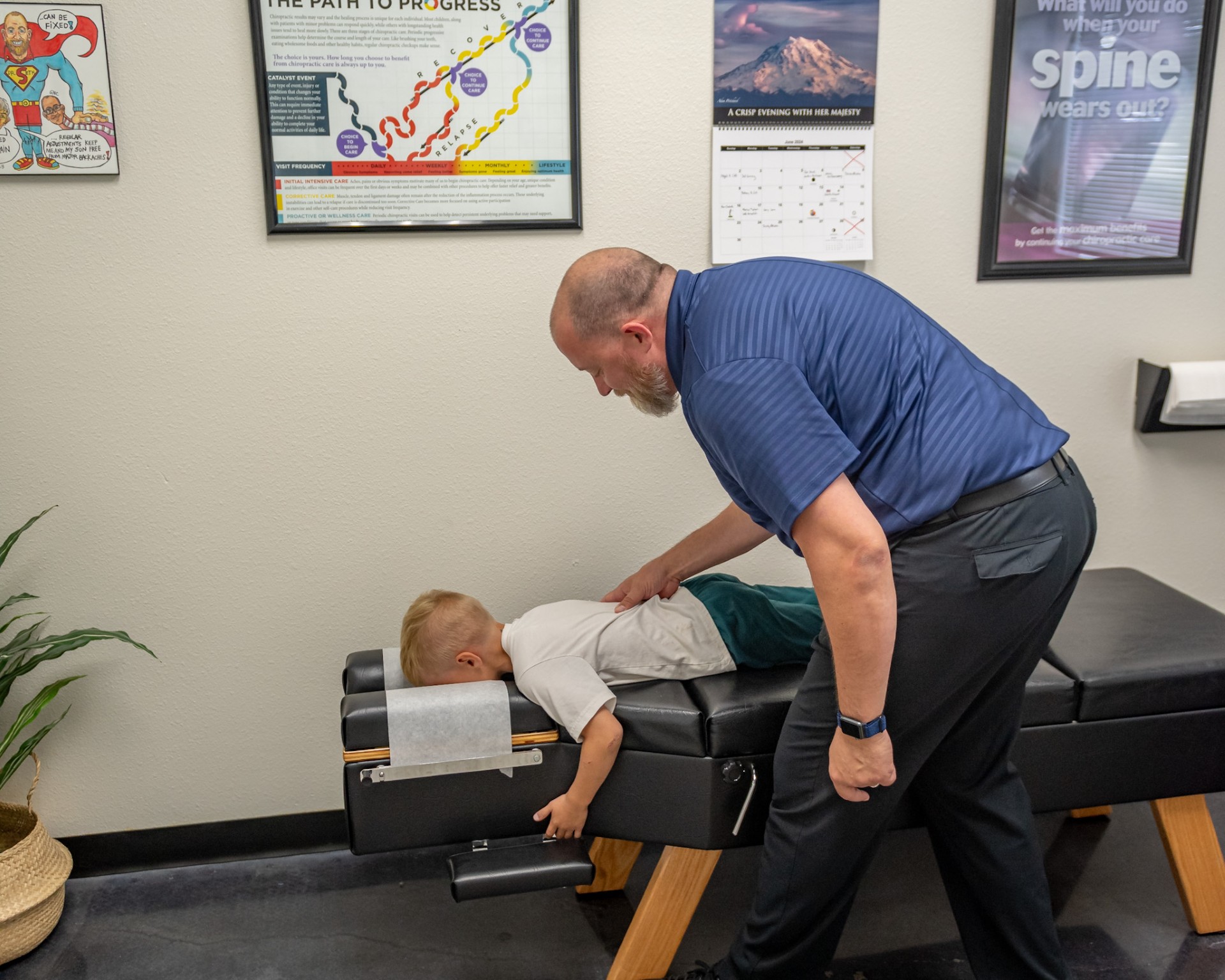 Dr. Anderson adjusting a child at Discover Chiropractic